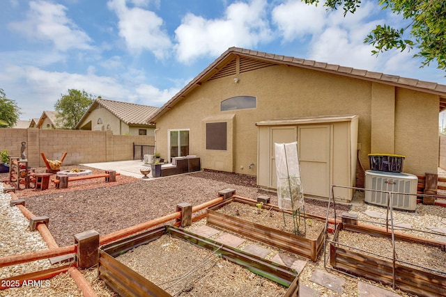 10226 W Country Club Trl, Peoria, AZ 85383 - back of house with a garden, stucco siding, cooling unit, and a patio area