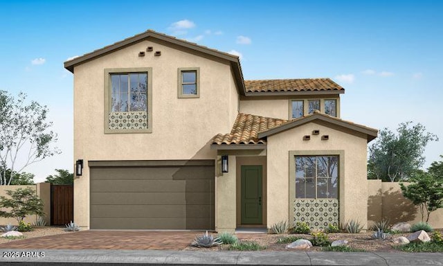 mediterranean / spanish house with a garage, a tile roof, fence, decorative driveway, and stucco siding