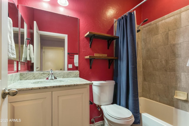 full bathroom with vanity, toilet, and shower / bath combo