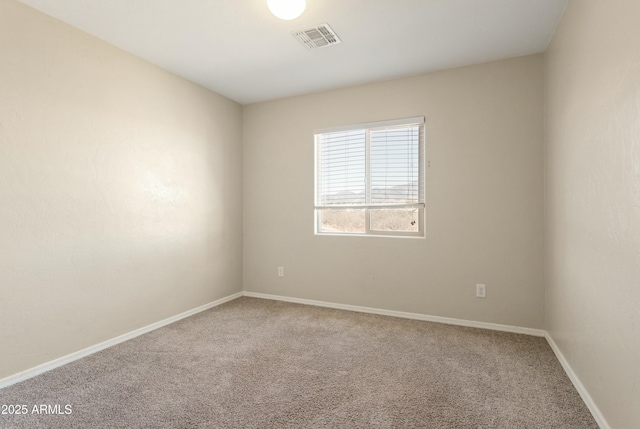 unfurnished room featuring carpet flooring