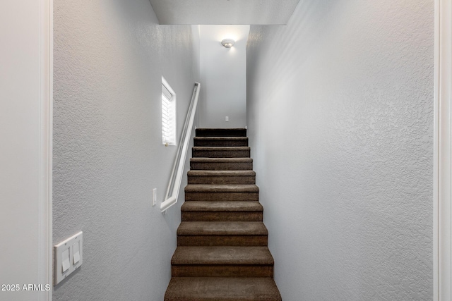 2941 E Darrow St, Phoenix, AZ 85042 - staircase featuring a textured wall