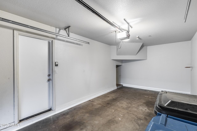 2941 E Darrow St, Phoenix, AZ 85042 - garage with a garage door opener and baseboards