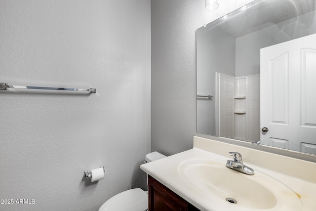 2941 E Darrow St, Phoenix, AZ 85042 - bathroom with vanity, a shower, and a textured wall