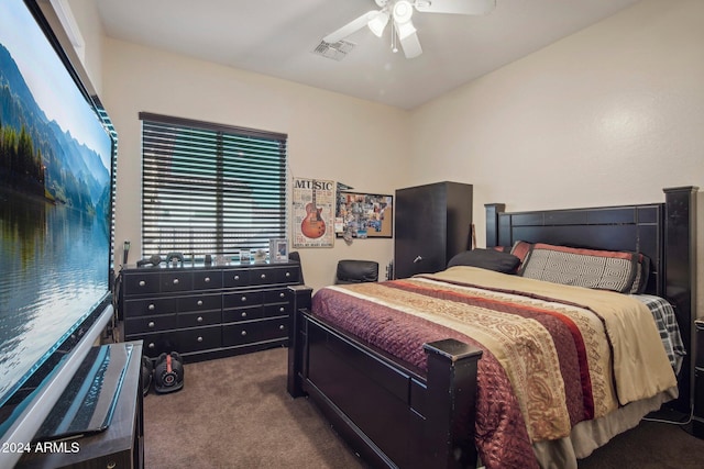 bedroom featuring ceiling fan and carpet floors