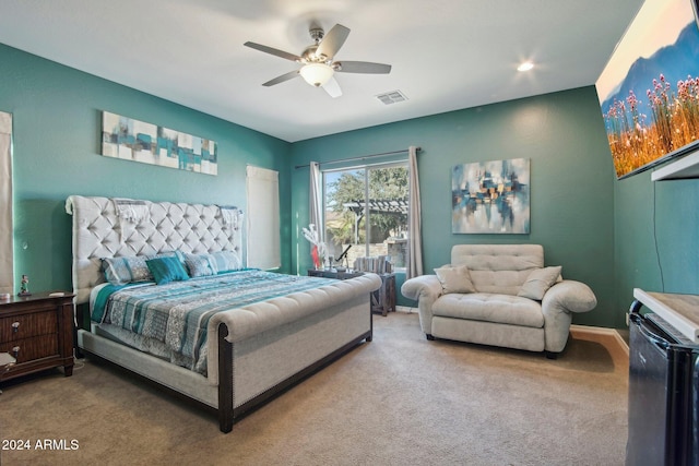 carpeted bedroom with ceiling fan