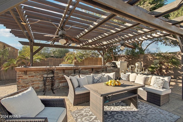 view of patio with a pergola, an outdoor living space, and a bar