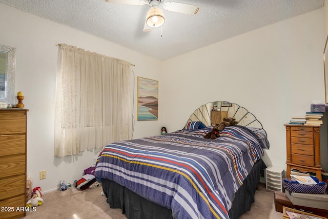 619 E Elaine St, Casa Grande, AZ 85122 - carpeted bedroom with baseboards, a textured ceiling, and ceiling fan