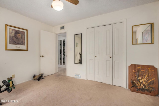 619 E Elaine St, Casa Grande, AZ 85122 - unfurnished bedroom with carpet floors, a closet, and visible vents