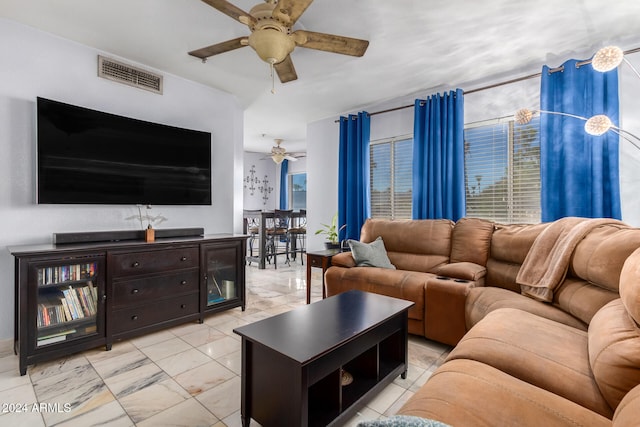 living room featuring ceiling fan