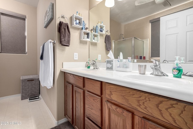 bathroom with a shower with door and vanity