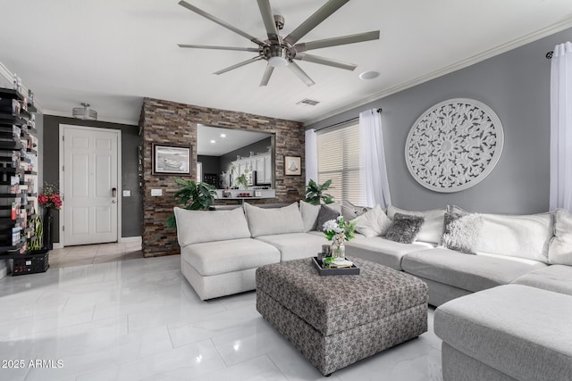 living room featuring ceiling fan and ornamental molding