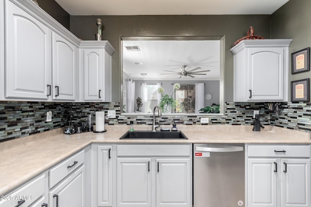 kitchen featuring white cabinetry, dishwasher, ceiling fan, sink, and tasteful backsplash