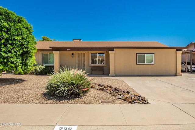 ranch-style house with a patio area