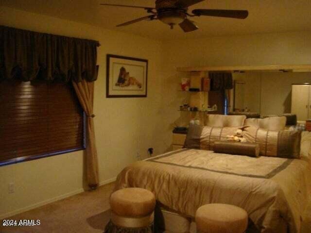 bedroom featuring carpet flooring and ceiling fan