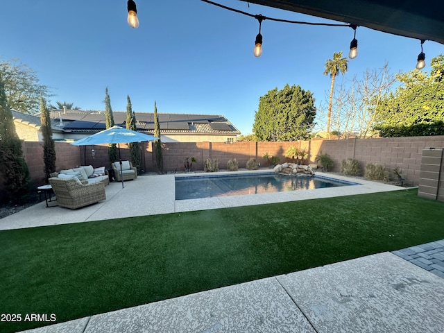 view of yard with a patio area, an outdoor living space, a fenced in pool, and a fenced backyard