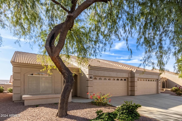 view of front of property featuring a garage