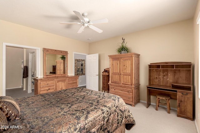 bedroom featuring ceiling fan and light colored carpet