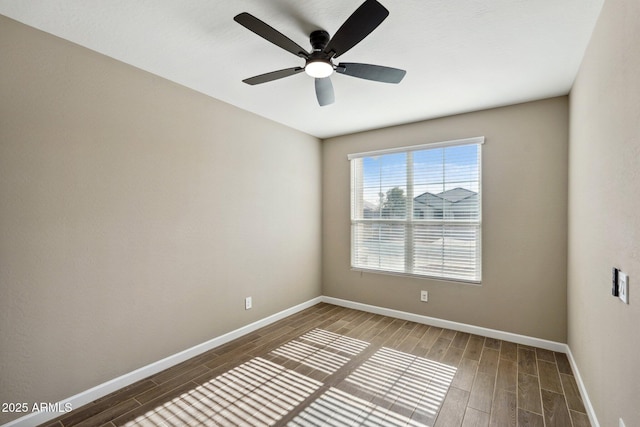 unfurnished room with ceiling fan