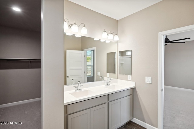 bathroom with vanity and ceiling fan