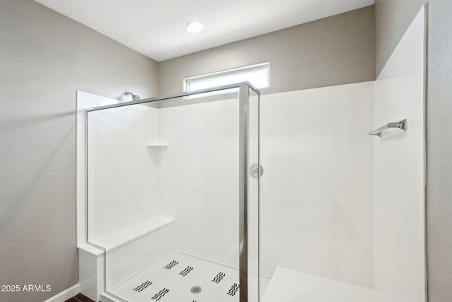 bathroom featuring walk in shower