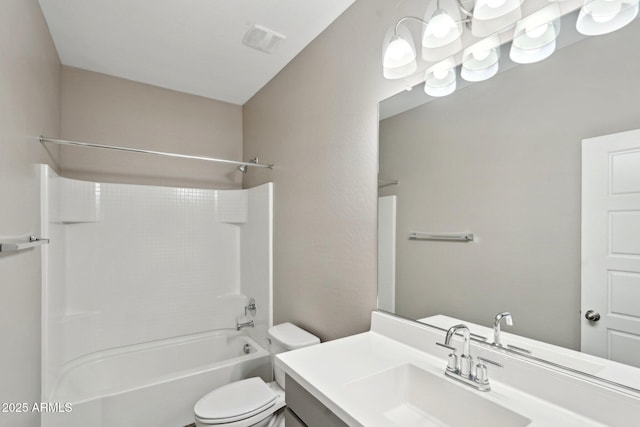 full bathroom featuring toilet, vanity, and shower / bathing tub combination