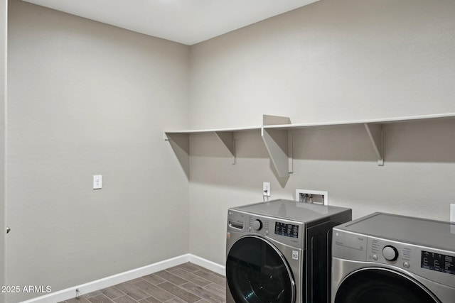 laundry room with washer and dryer