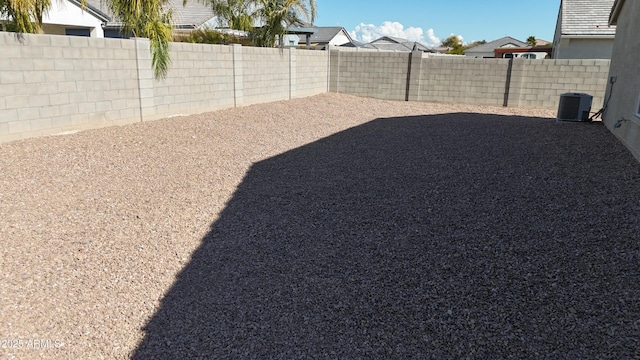 view of yard featuring central AC unit