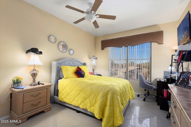 tiled bedroom with ceiling fan