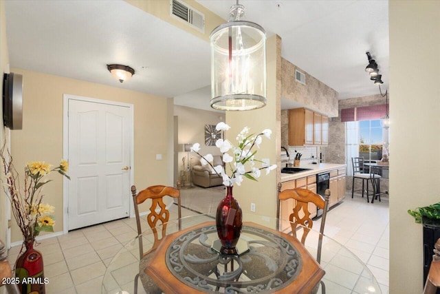 tiled dining space with sink