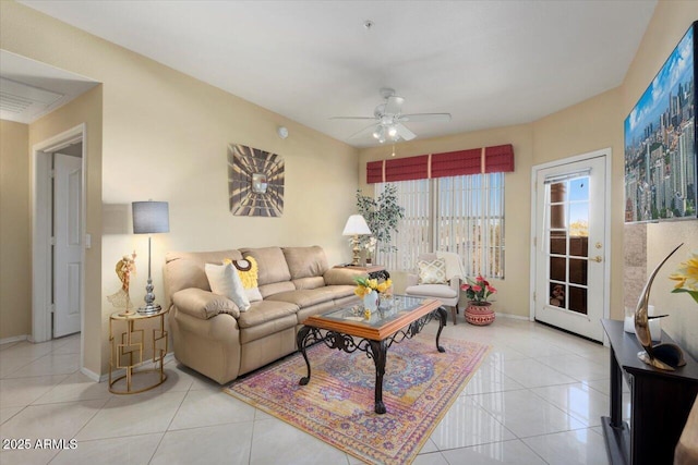 living room featuring ceiling fan and light tile patterned flooring