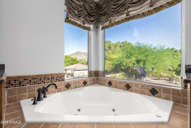 bathroom featuring a jetted tub