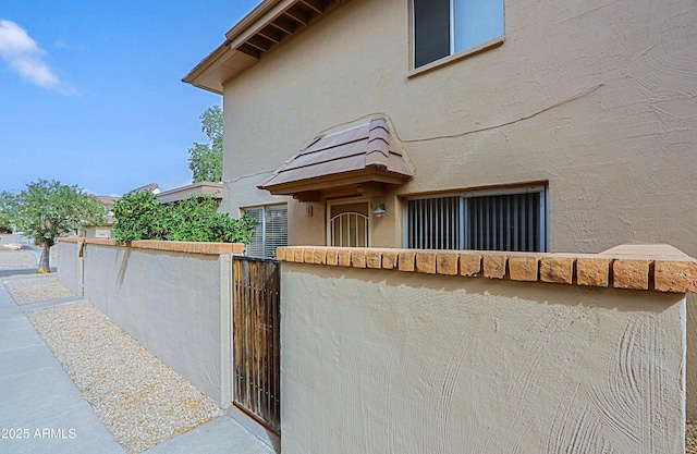 17031 E Calle Del Oro Unit B, Fountain Hills, AZ 85268 - exterior space with stucco siding and fence
