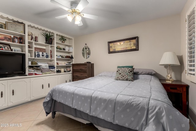 bedroom featuring light tile patterned floors and ceiling fan