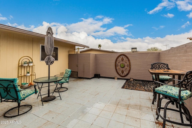 view of patio / terrace with fence and outdoor dining space