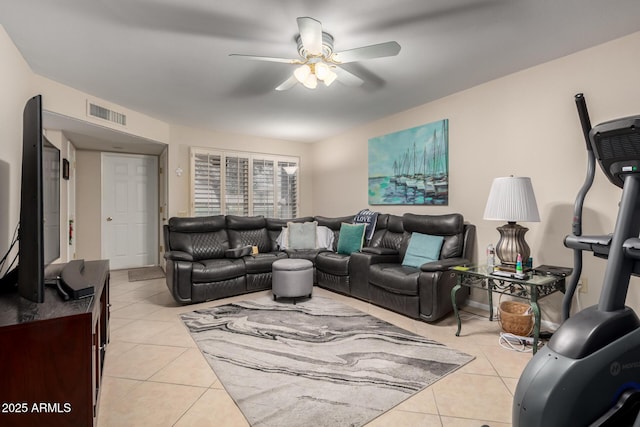 living room featuring ceiling fan, visible vents, and light tile patterned flooring