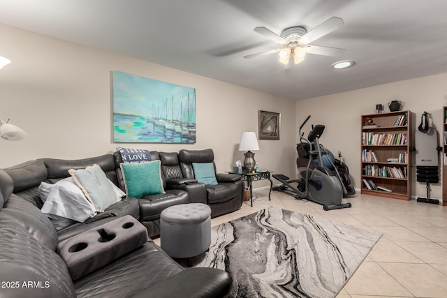 living area featuring a ceiling fan and light tile patterned floors