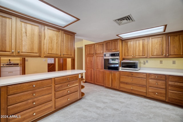 kitchen featuring kitchen peninsula and stainless steel appliances