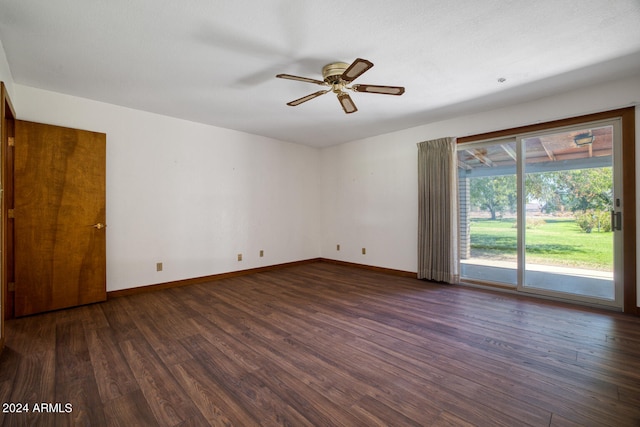 spare room featuring dark hardwood / wood-style floors, ceiling fan, and a textured ceiling