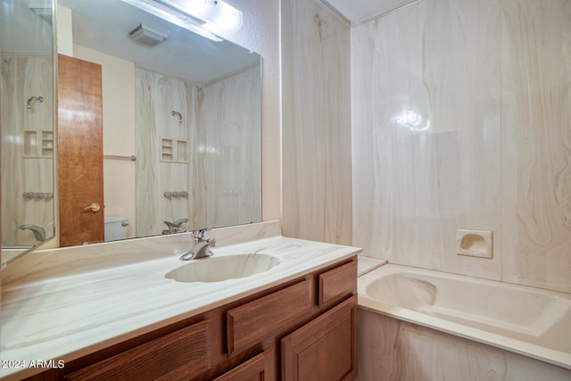 full bathroom with vanity, toilet, and shower / bathtub combination