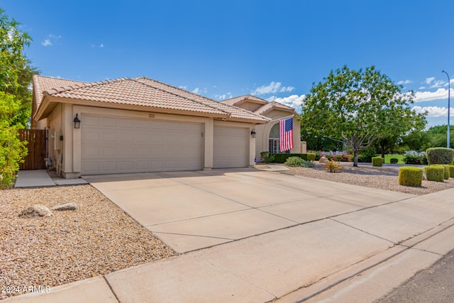 view of front of property with a garage