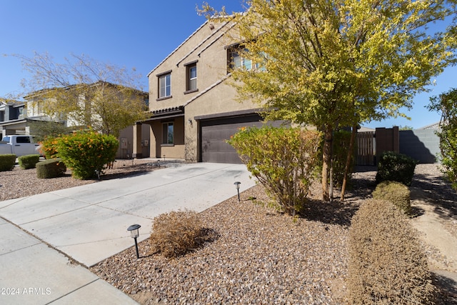 view of front of property featuring a garage