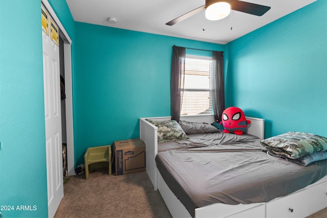 carpeted bedroom with ceiling fan