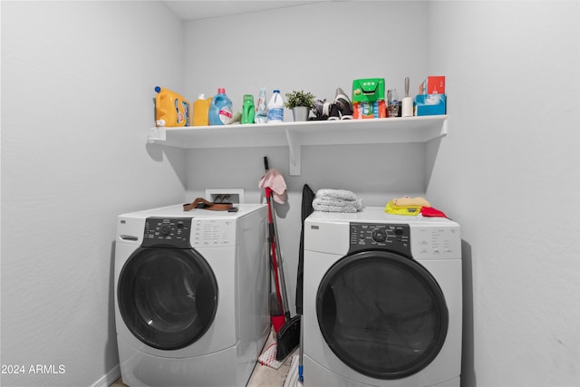 clothes washing area with washer and dryer