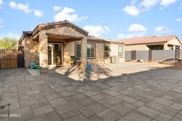 rear view of house featuring a patio area