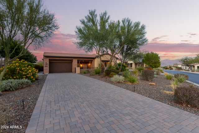 view of front of property featuring a garage