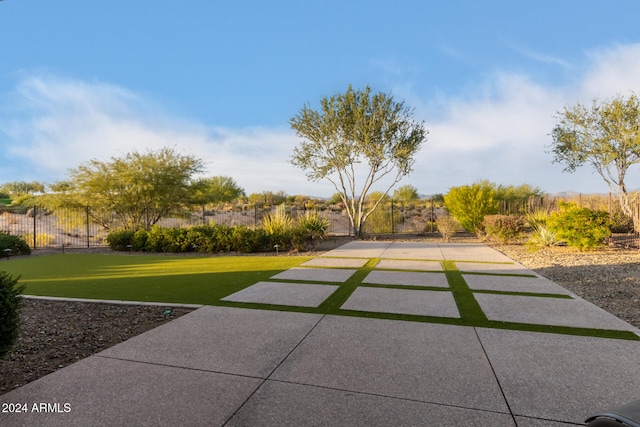 exterior space featuring a patio and a yard