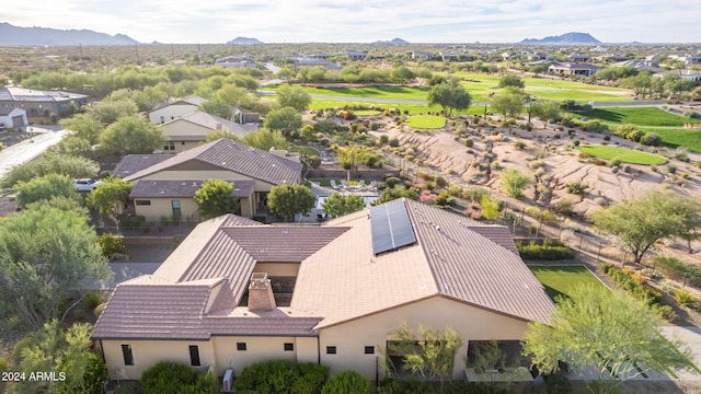 birds eye view of property featuring a mountain view