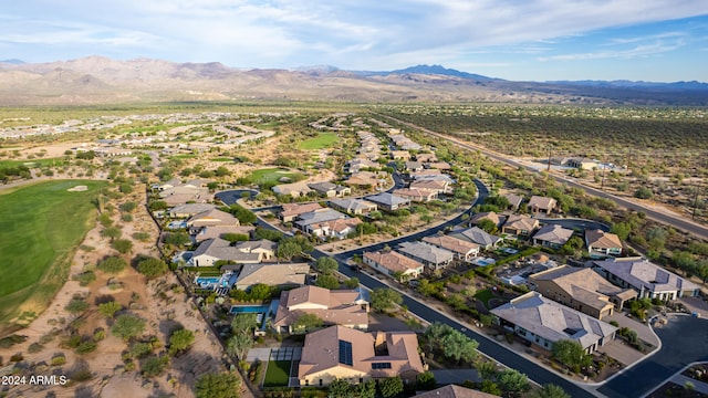 birds eye view of property featuring a mountain view