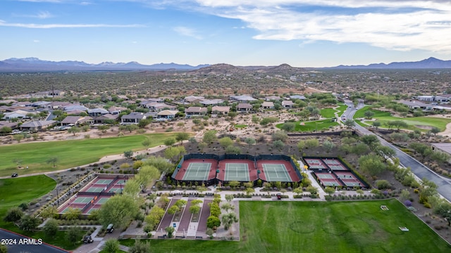 birds eye view of property with a mountain view