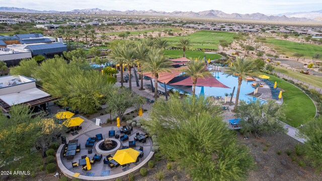 birds eye view of property featuring a mountain view